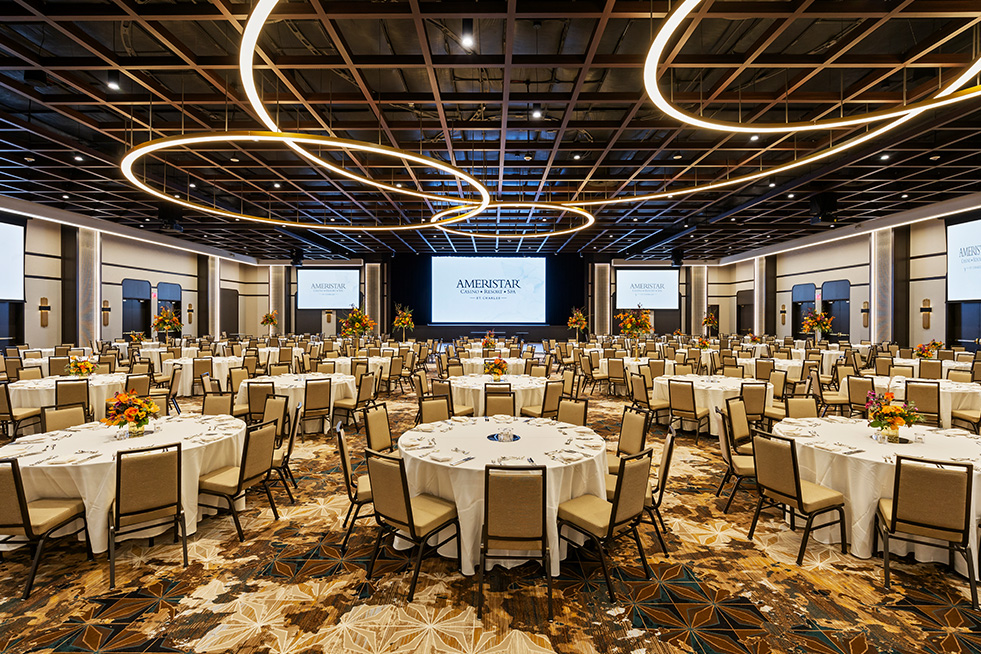 brilliance ballroom with tables and screens
