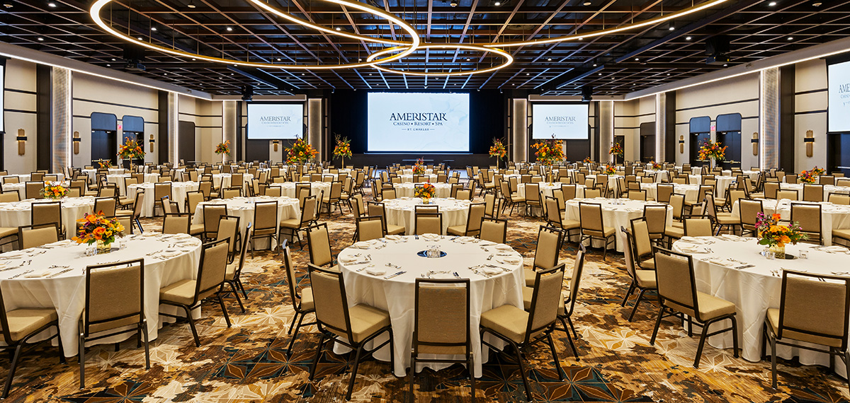 brilliance ballroom with tables and screens